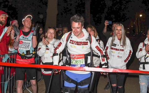 Athlete with paralysis finishes marathon in 36 hours
